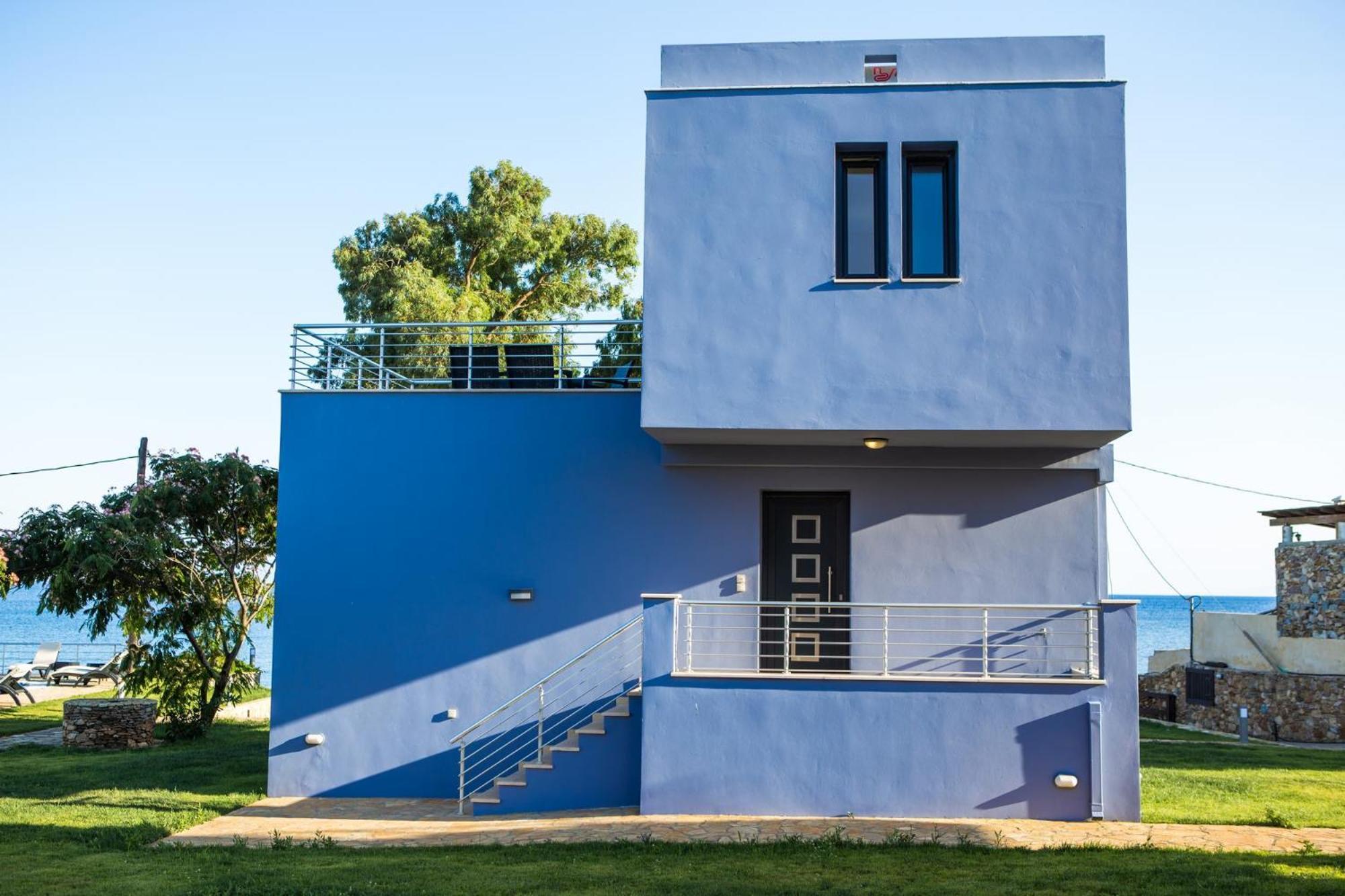 Blue Waves Luxury Suites By The Sea Plomari 外观 照片